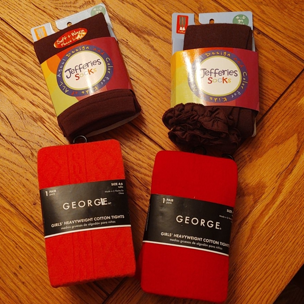 4 pairs of assorted tights. Little girls